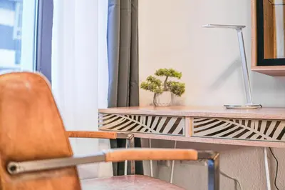 Grundriss der Unterkunft Stylisches Stadtnest mit Xbox