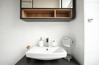 Ein Badezimmer in der Unterkunft Stylisches Stadtnest mit Xbox