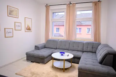 Ein Sitzbereich in der Unterkunft PrimeTime Suite für 8+Küche/WIFI