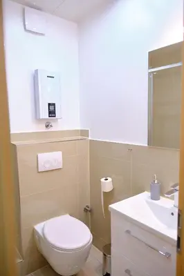 Ein Badezimmer in der Unterkunft PrimeTime Suite für 8+Küche/WIFI