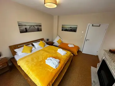 Ein Bett oder Betten in einem Zimmer der Unterkunft CATS Home and Apartment