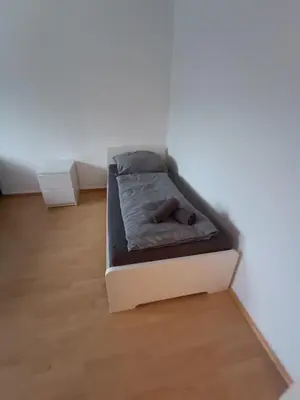 Ein Bett oder Betten in einem Zimmer der Unterkunft Mont Apartments