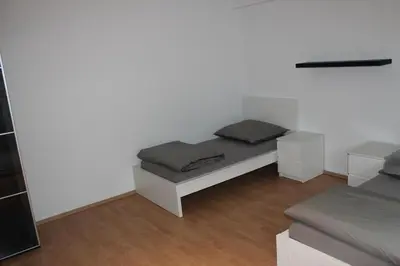 Ein Bett oder Betten in einem Zimmer der Unterkunft Mont Apartments