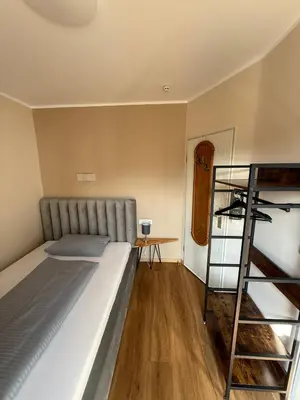 Ein Bett oder Betten in einem Zimmer der Unterkunft Hotel & Restaurant Elbschetal