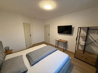 Ein Bett oder Betten in einem Zimmer der Unterkunft Hotel & Restaurant Elbschetal