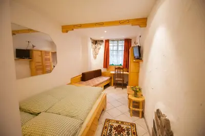Ein Bett oder Betten in einem Zimmer der Unterkunft Hotel & Restaurant Elbschetal