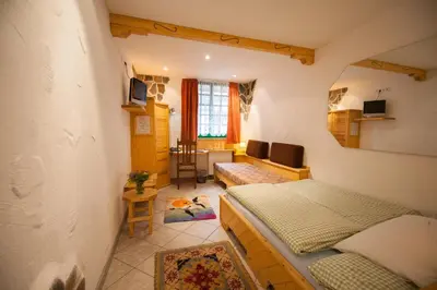 Ein Bett oder Betten in einem Zimmer der Unterkunft Hotel & Restaurant Elbschetal