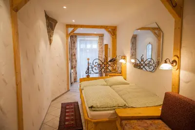 Ein Bett oder Betten in einem Zimmer der Unterkunft Hotel & Restaurant Elbschetal