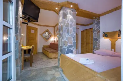 Ein Bett oder Betten in einem Zimmer der Unterkunft Hotel & Restaurant Elbschetal