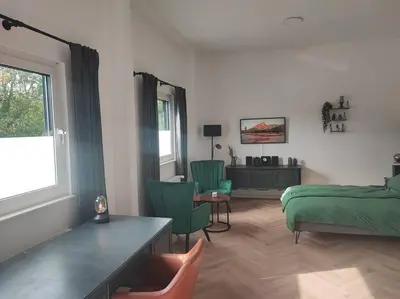 Ein Sitzbereich in der Unterkunft Stilvolles Appartment in Hagen