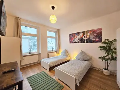 Ein Bett oder Betten in einem Zimmer der Unterkunft Nice Apartment in Wuppertal