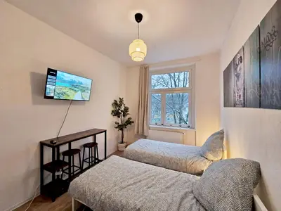 Ein Bett oder Betten in einem Zimmer der Unterkunft Nice Apartment in Wuppertal