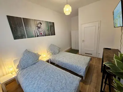 Ein Bett oder Betten in einem Zimmer der Unterkunft Nice Apartment in Wuppertal