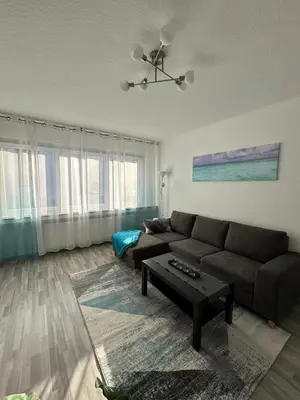 Ein Sitzbereich in der Unterkunft Ferienwohnung in Hattingen Südstadt