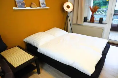 Ein Bett oder Betten in einem Zimmer der Unterkunft Besinnliches Bijou, Klein, aber oho mit Wohlfühlfaktor