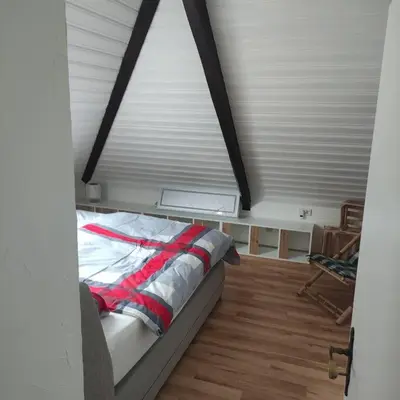 Ein Bett oder Betten in einem Zimmer der Unterkunft Aussicht auf die Altstadt Lennep