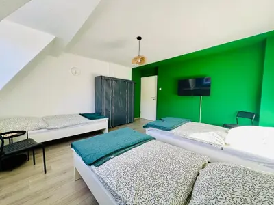 Ein Bett oder Betten in einem Zimmer der Unterkunft Urban Green Monteur Appartement Hagen