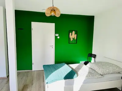 Ein Bett oder Betten in einem Zimmer der Unterkunft Urban Green Monteur Appartement Hagen