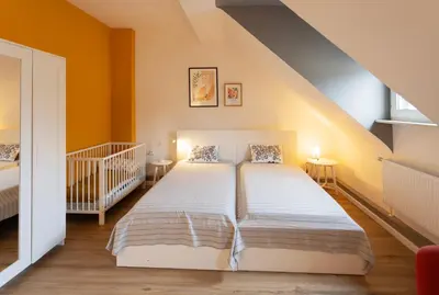 Ein Bett oder Betten in einem Zimmer der Unterkunft Big flat with fresh renovation, free parking, SonyPS, Netflix