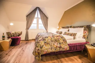 Ein Bett oder Betten in einem Zimmer der Unterkunft Landhotel Voshövel