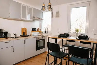 Küche/Küchenzeile in der Unterkunft Modern & black - City - Netflix - Wifi - 4 Person