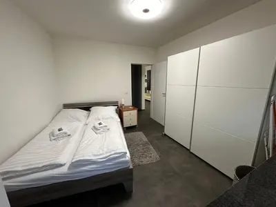 Ein Bett oder Betten in einem Zimmer der Unterkunft Moderne Ferienwohnung für 4 Personen im Herzen von Marl*Netflix*Nespresso*