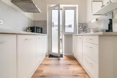 Küche/Küchenzeile in der Unterkunft MODERN & MINIMAL - Design-Apartment in Stadtmitte