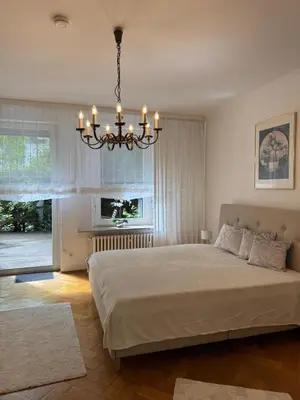 Ein Bett oder Betten in einem Zimmer der Unterkunft Stadtvillenwohnung nahe Zentrum / Ruhrfestspielhaus