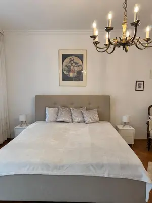 Ein Bett oder Betten in einem Zimmer der Unterkunft Stadtvillenwohnung nahe Zentrum / Ruhrfestspielhaus