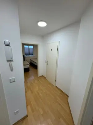 Ein Bett oder Betten in einem Zimmer der Unterkunft Alex Apartment's 2