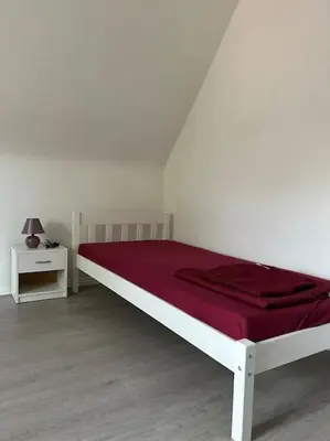 Ein Bett oder Betten in einem Zimmer der Unterkunft Monteur-Suite ,Appartement AVD 7