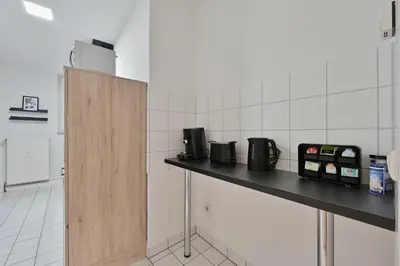 Küche/Küchenzeile in der Unterkunft Goodliving Apartments mit Netflix Büro und Parkplatz