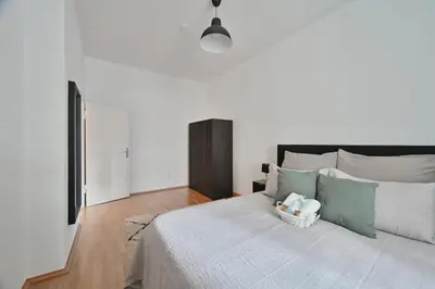 Ein Bett oder Betten in einem Zimmer der Unterkunft Goodliving Apartments mit Netflix Büro und Parkplatz