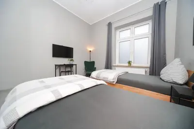 Ein Bett oder Betten in einem Zimmer der Unterkunft Apartment Central 85B 40qm Wi-Fi free