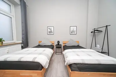 Ein Bett oder Betten in einem Zimmer der Unterkunft Apartment Central 85B 40qm Wi-Fi free