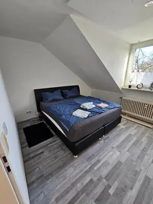 Ein Bett oder Betten in einem Zimmer der Unterkunft Duisburg Zentral Nord