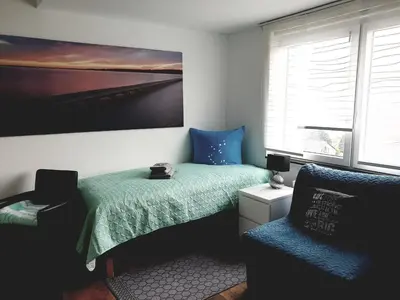 Ein Bett oder Betten in einem Zimmer der Unterkunft FEWO Solingen Abendstrasse