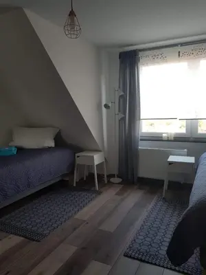 Ein Bett oder Betten in einem Zimmer der Unterkunft FEWO Solingen Abendstrasse