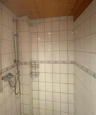 Ein Badezimmer in der Unterkunft Schönes Apartment mit TV, WLAN, Kochbereich und Parkplatz - Sara