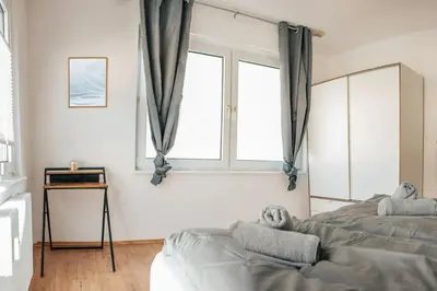 Ein Bett oder Betten in einem Zimmer der Unterkunft bright & grey - Netflix - City - Wifi - 4 Person