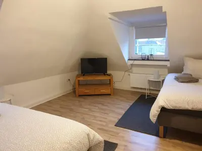 Ein Bett oder Betten in einem Zimmer der Unterkunft Solingen Bruehlerstrasse
