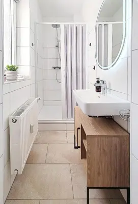 Ein Badezimmer in der Unterkunft LIVATION - Apartments Hamm-Mitte - 2 Zi - Nespresso - SmartTV - freeWiFi - ausgestattete Küche - 24h Check-In - bis 4 Pers pro Apartment