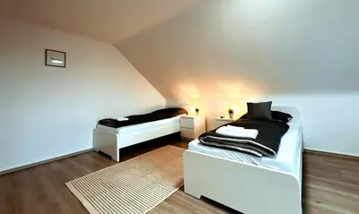 Ein Bett oder Betten in einem Zimmer der Unterkunft Exklusive Wohnung für Monteure in Bochum