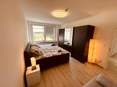 Ein Bett oder Betten in einem Zimmer der Unterkunft Zur schönen Aussicht I 150 I Oase I Purer Luxus