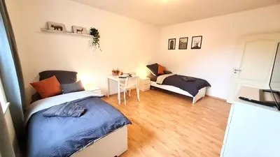 Ein Sitzbereich in der Unterkunft Modernes Apartment für 5 Personen