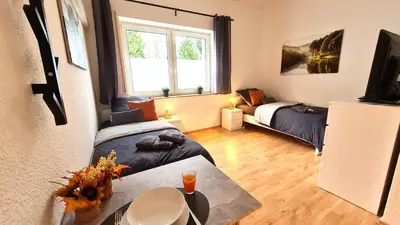 Ein Sitzbereich in der Unterkunft Modernes Apartment für 5 Personen