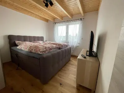 Ein Bett oder Betten in einem Zimmer der Unterkunft Helles ruhiges Appartement im Grünen
