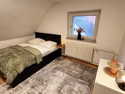 Ein Bett oder Betten in einem Zimmer der Unterkunft FlattyOne Ruhrgebiet - Schlafkomfort und Anbindung - neu renoviert