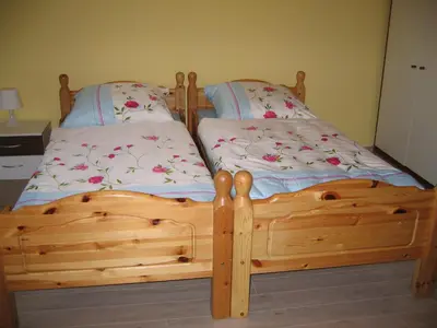 Ein Bett oder Betten in einem Zimmer der Unterkunft Ferienwohnung Bottrop Radetzki