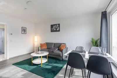 Ein Sitzbereich in der Unterkunft 44 Apartments - Modern, Gemütlich, WLAN, Balkon, Stellplatz